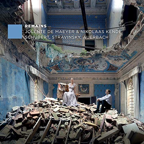 "CD cover featuring a damaged blue room with two people amidst rubble and debris."