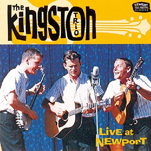 The Kingston Trio performing with guitars and a microphone at Newport.