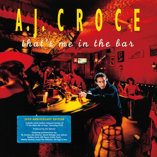 Album cover with man sitting alone at a dimly lit bar with patrons.