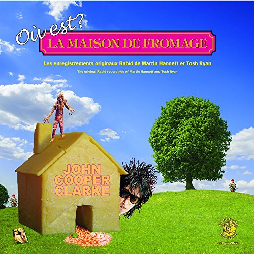Album cover: yellow house, figures, and blue sky with text "Où Est La Maison De Fromage?".