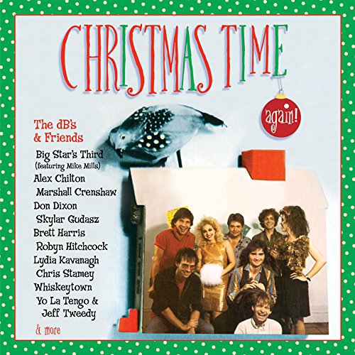 "Christmas album cover with green border, red title, and group photo inside mailbox."