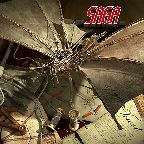 Saga - Trust" vinyl album cover featuring a steampunk-style mechanical wing.