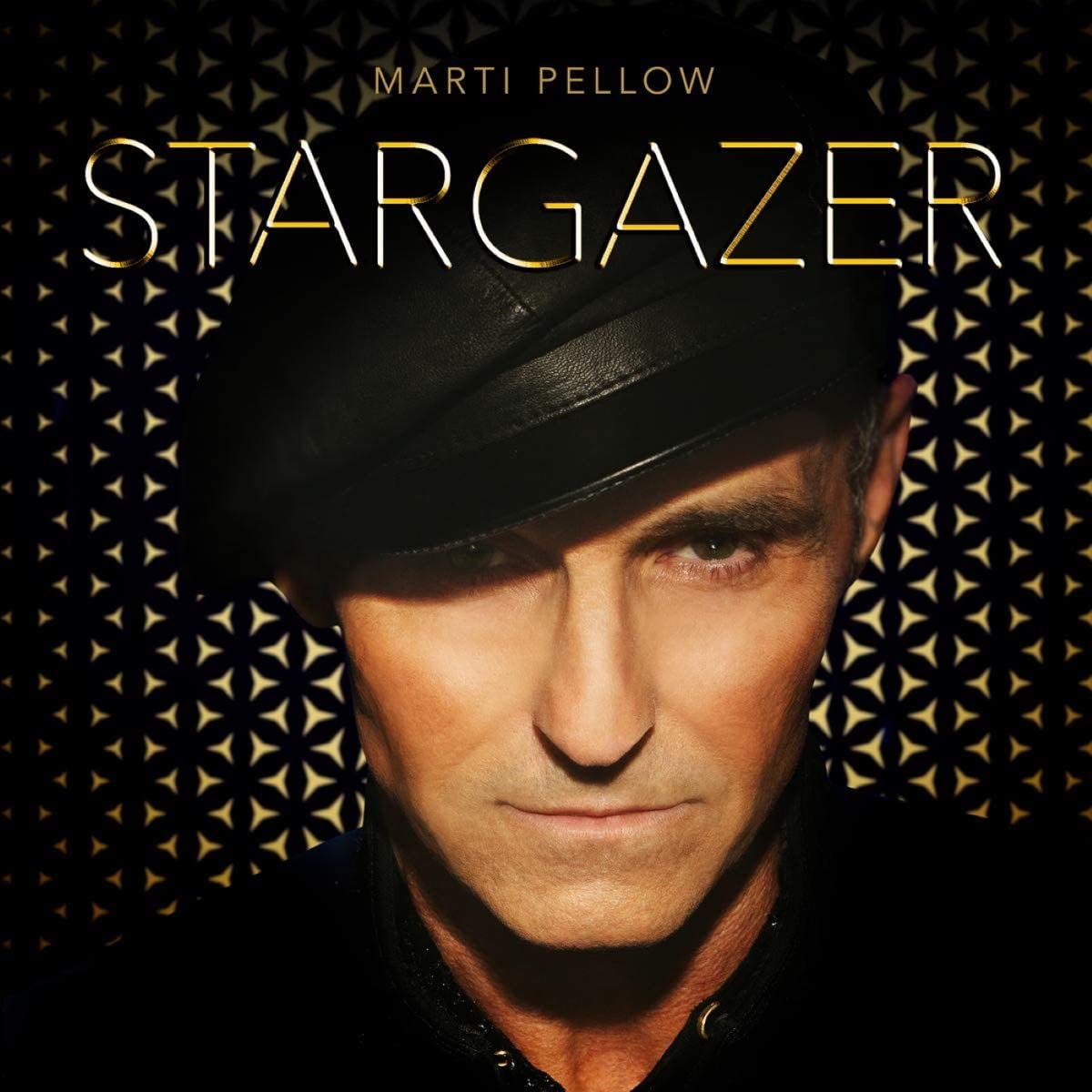 Marti Pellow album cover, close-up portrait with a black cap.