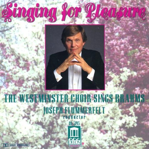"CD cover with conductor Joseph Flummerfelt and floral background."