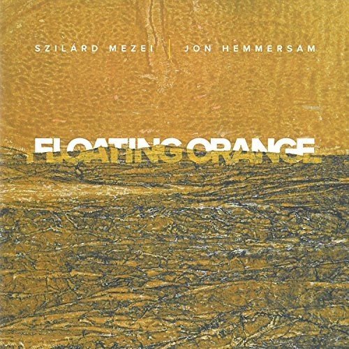 "Album cover with orange and black textured background, titled 'Floating Orange' in white text."
