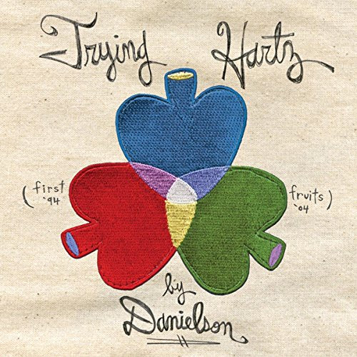 CD cover: embroidered clover with text “Trying Hartz: First Fruits 1994-2004.”