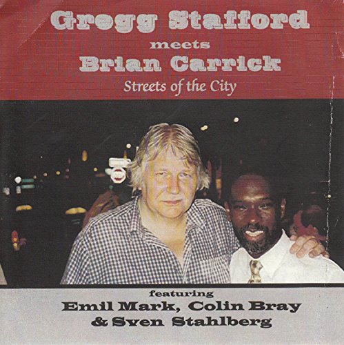 "CD cover with two men and text describing the album and artists."