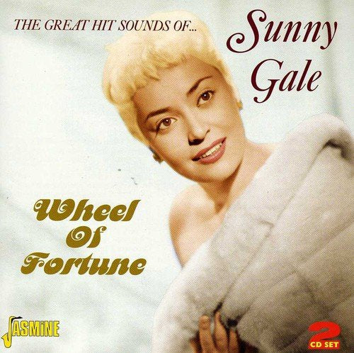 "CD cover featuring a blonde woman wrapped in a white blanket, smiling."
