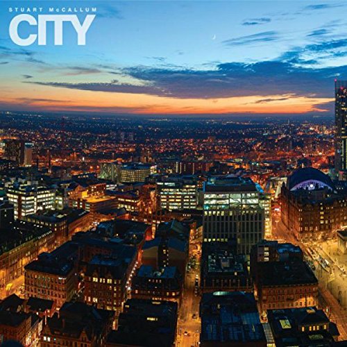 "Album cover with cityscape at dusk, lit buildings, and 'Stuart McCallum City' text."