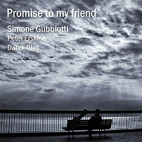 "Album cover featuring a black-and-white image of two people sitting on a bench."