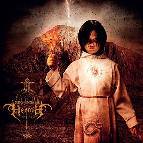 "Album cover with a child in white robe holding a flame, dark mountain background."