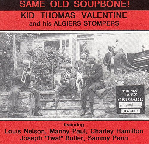 "Album cover with black and white photo of jazz musicians outdoors, red and black text."