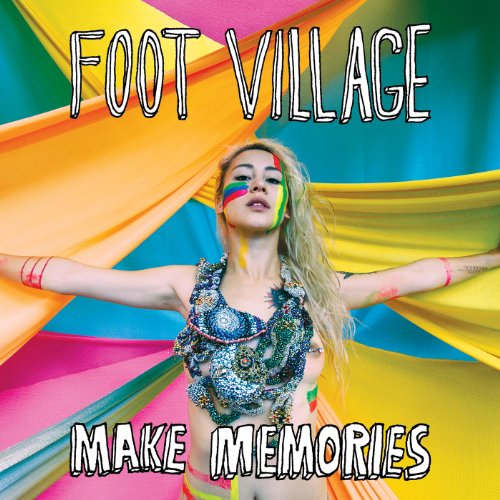 A woman with colorful face paint stands against a multicolored fabric background.