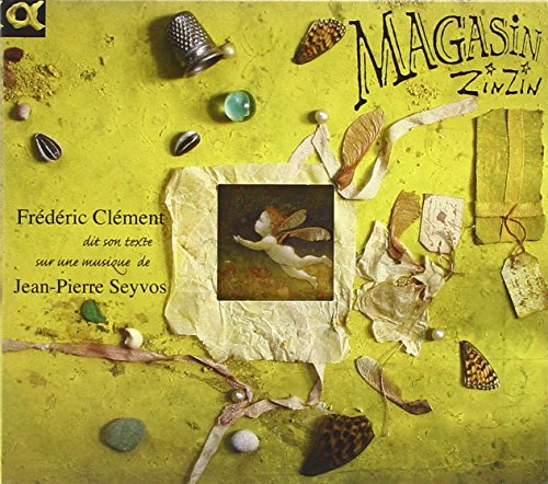 "Yellow CD cover with seashells, a fairy image, and 'MAGASIN ZINZIN' text."