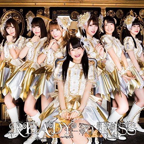 Six women in ornate gold and white outfits pose for a CD cover.