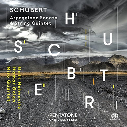 "CD cover with landscape photo and 'Schubert' text, featuring white and yellow lettering."