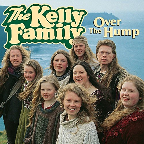 Album cover for "Over the Hump" by The Kelly Family, a large group portrait.