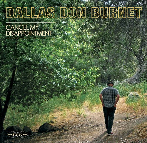 Album cover featuring a man walking down a dirt path surrounded by trees.