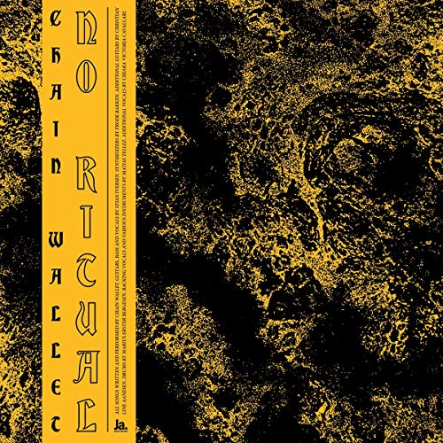 Black and yellow abstract vinyl record cover with stylized text on a vertical strip.