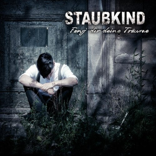 CD cover: person with head down sits before a weathered door.