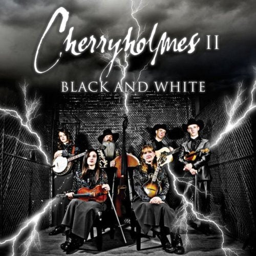 "Album cover featuring a band in black, surrounded by lightning and a metal fence."