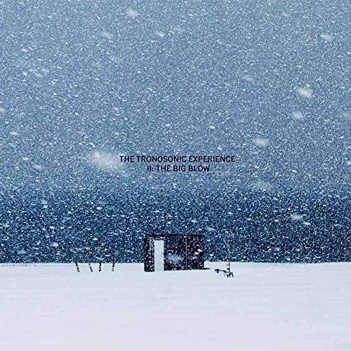 CD cover: Snowy landscape with a small, dark building in the distance.