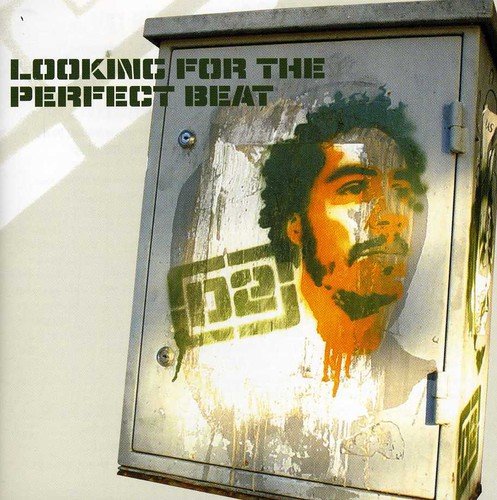 "CD album cover with a man's portrait on a metal panel."