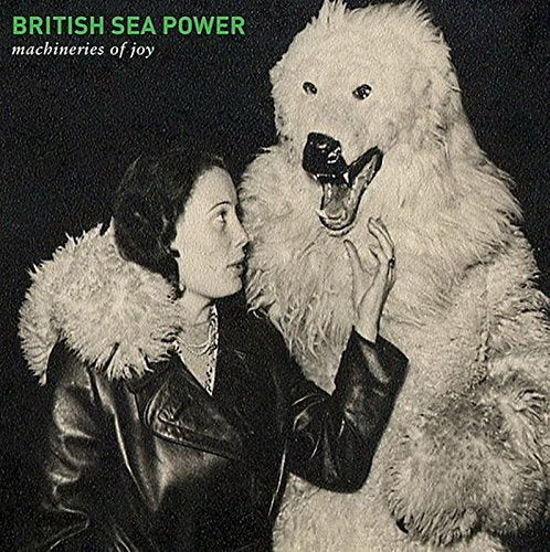 Album cover: Woman and a large, furry animal head in vintage style.