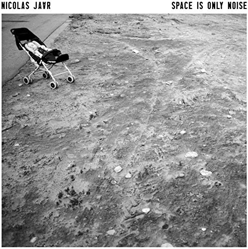 Black and white album cover featuring a shopping cart on gravel.