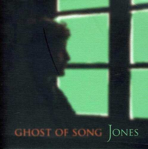 "CD cover with silhouette of a person against a green window background."