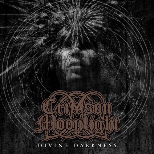 Dark, atmospheric album cover featuring a shadowed face and ornate lettering.