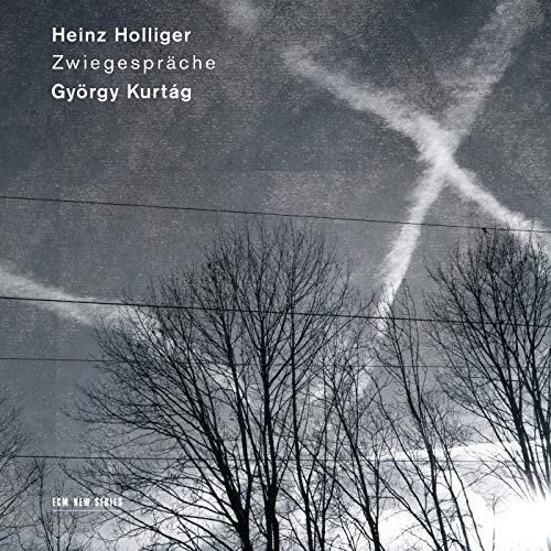 CD cover: Sky with contrails over silhouetted bare trees.
