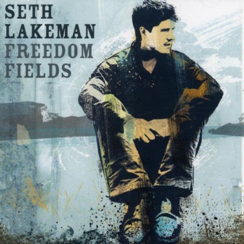 Album cover featuring a man sitting with his elbows on his knees, outdoors.