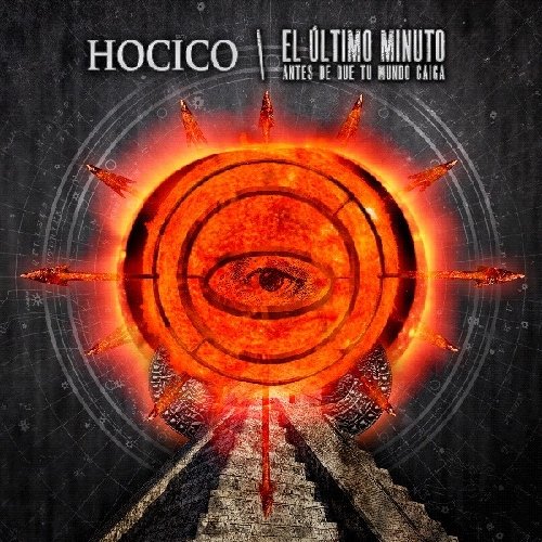 CD cover: dark, circular design with a glowing eye and fiery elements.