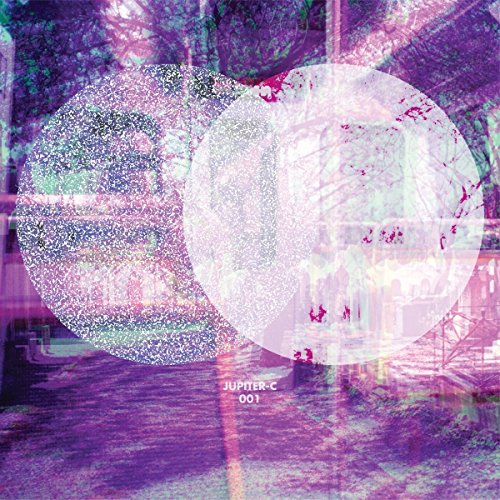 Vinyl record cover with overlapping circles and distorted urban imagery.