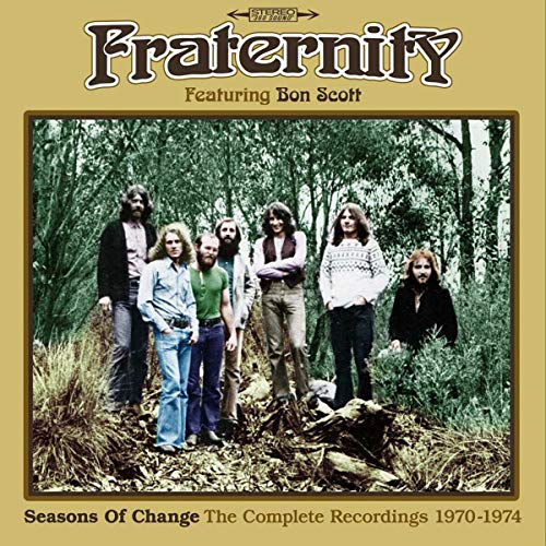 "CD cover with a band photo of seven men in a forest on a yellow background."