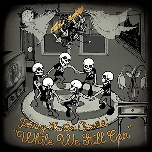 CD cover: skeletons dancing in a room with vintage furniture.