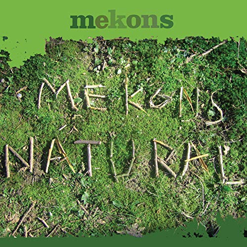 CD cover for The Mekons’ “Natural” album with twigs spelling out text on grass.