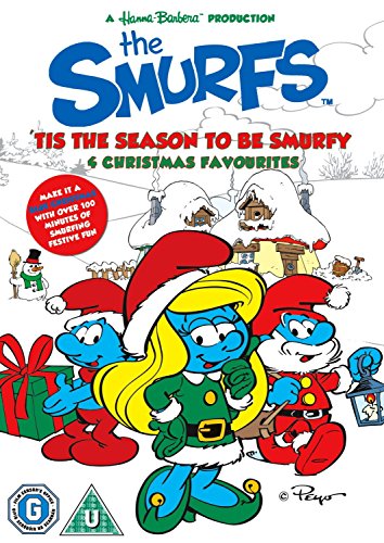 DVD cover featuring three Smurfs in festive outfits, with snowy village in the background.