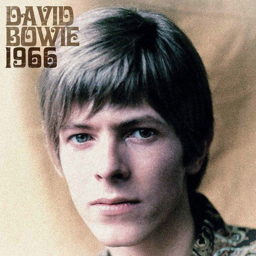 "David Bowie album cover with a portrait of young David Bowie against a beige background."