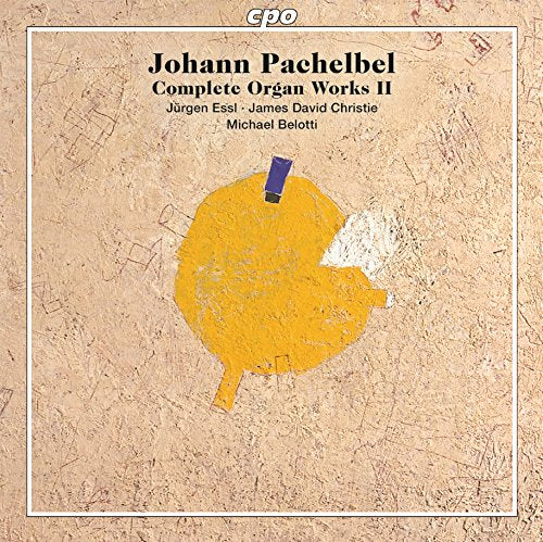 CD cover with beige background, yellow paint splatter, and "Johann Pachelbel" in black text.