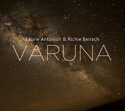 Album cover with "Varuna" in large text against a starry night sky background.