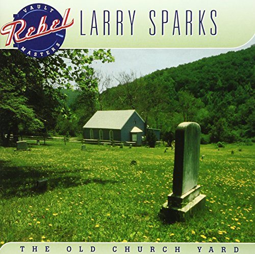 The image depicts a serene churchyard scene. A concise, descriptive alt text for this image could be: "Album cover featuring a weathered headstone in a grassy churchyard with a small chapel and forested hillside."