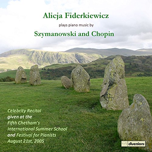 "CD cover featuring large stones in a green field with mountains in background."