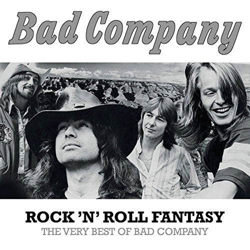 "Black and white album cover featuring a band photo with four members and text."