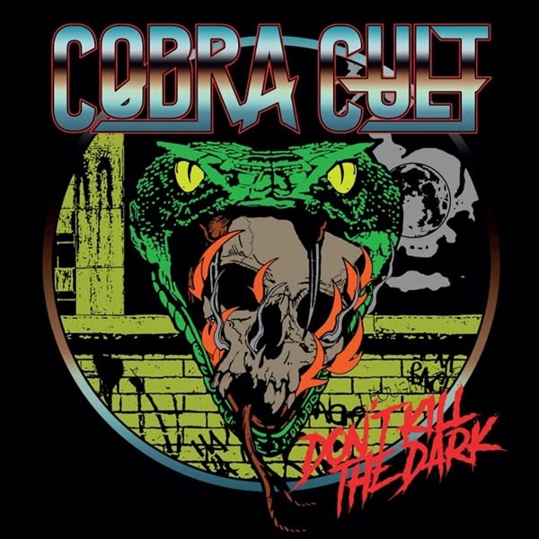 Cobra Cult album cover featuring a cobra, skull, and moonlit cityscape.
