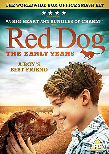 DVD cover featuring a boy and a red dog with orange desert landscape.
