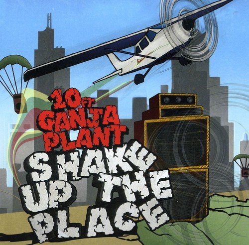 CD cover: airplane, parachutists, speakers, and city skyline illustration.