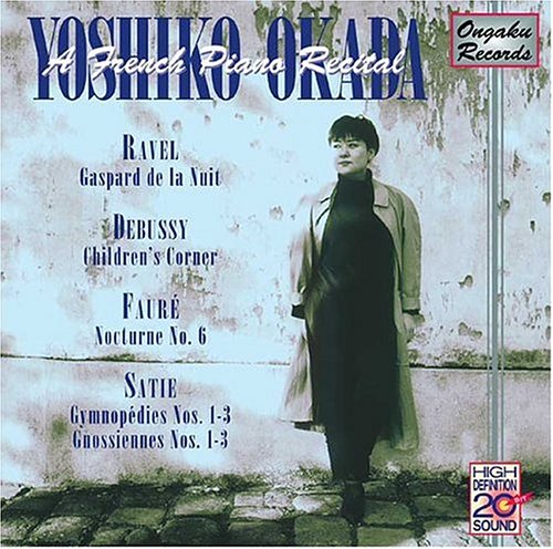 CD cover featuring pianist Yoshiko Okada in a dark coat.