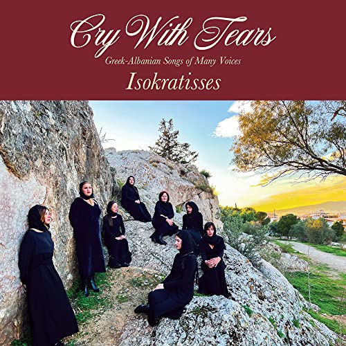 CD cover: group of women in black robes with a rocky landscape.